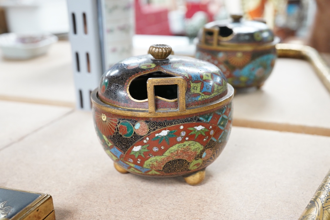 A Japanese damascened iron parasol handle, a cloisonné enamel koro and Komai style mirrored musical compact, largest 24cm in length